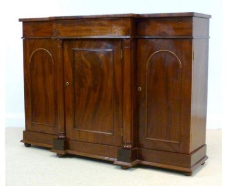 A 19th century mahogany breakfront sideboard server, central frieze cutlery drawer over three cupboard doors, the central pan