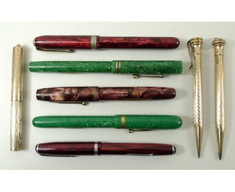 A Whal Eversharp gold plated fountain pen and propelling pencil set, a propelling pencil, and a collection of 1950's fountain