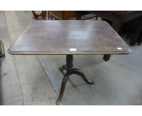 A George III oak tripod table 