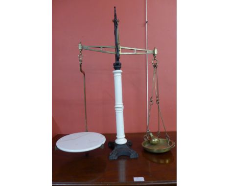A set of Victorian cast iron and porcelain balance scales 