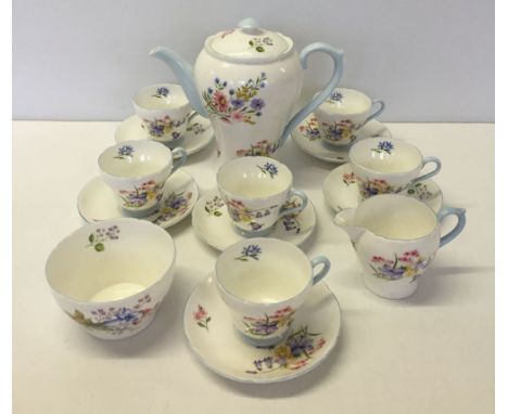 A Shelley 'Wild Flowers' pattern tea set comprising tea pot, milk jug, sugar bowl and 6 cups & saucers.