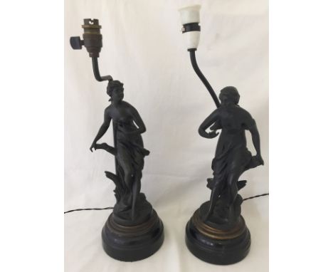  Later conversion to table lamps. On wooden plinths. Both signed and with Made in France verification stamp. With two lime gr