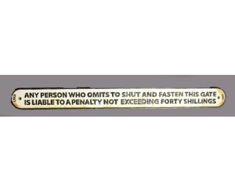 A replica cast iron L.N.E.R notice 'Any person who omits to shut and fasten this gate is liable to a penalty not exceeding fo