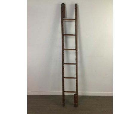 STUDDED LEATHER METAMORPHIC LIBRARY POLE LADDER,with single hook catch opening to reveal six steps, 205cm high open; 230cm cl