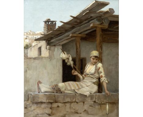 Théodore Jacques Ralli (Greek, 1852-1909)Fille assise sur un mur de pierre, filant la laine  signe 'Ralli' (en bas à gauche)h