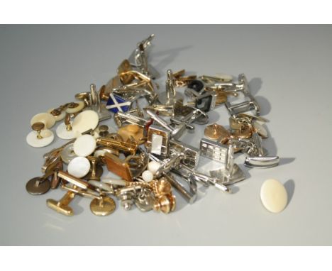 Several dozen pairs of largely mid to late 20th century cufflinks, together with some Edwardian mother of pearl set studs and
