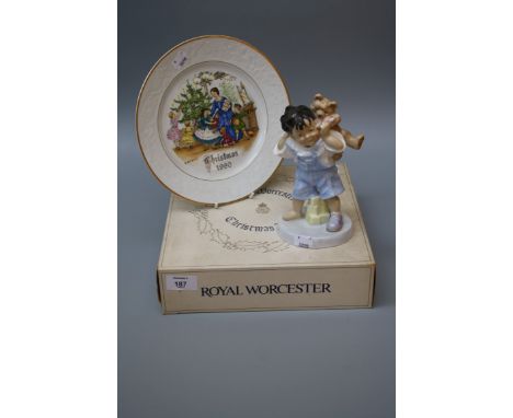 Seven Royal Worcester/Doulton Christmas plates, (six boxed), a Royal Worcester figure 'Piggyback Ride', a Sylvac terrier, a p