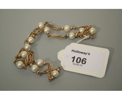 A 9ct gold and cultured pearl necklace, the pearls interspaced between twisted open links, 38cm length, Excellent condition, 