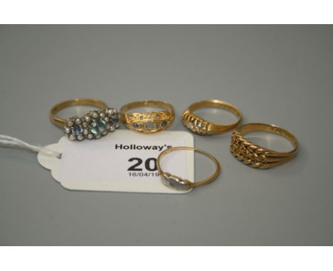 An Edwardian graduated five stone diamond half hoop ring, in 18ct gold mount, a triple cluster pearl set ring and three furth