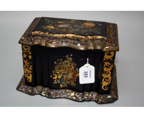 A Victorian papier maché mother of pearl inlaid and gilt florally decorated tea caddy, of serpentine outline, with twin lidde