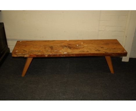 A rustic yew bench/window seat with single piece top on square splayed beech legs, 38 x 157 x 46cm