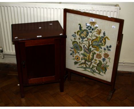 An Edwardian mahogany pot cupboard with panel door on square supports, together with an early 20th century firescreen/occasio