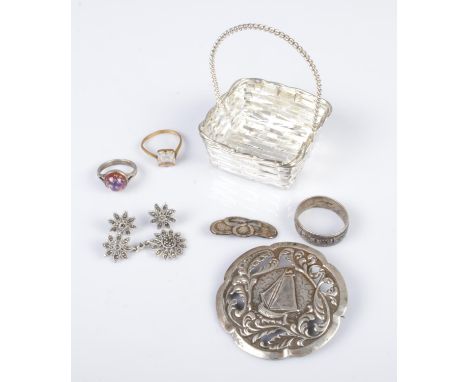 A collection of silver and white metal jewellery, including rings, pendant earring set, brooches and a jewellery basket.  One