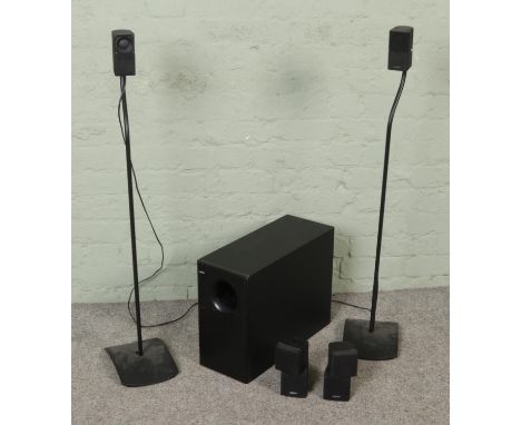 Bose Acoustimass 5 Series Speaker System, includes four speaks and two floor stands.  No cables included, unable to test.