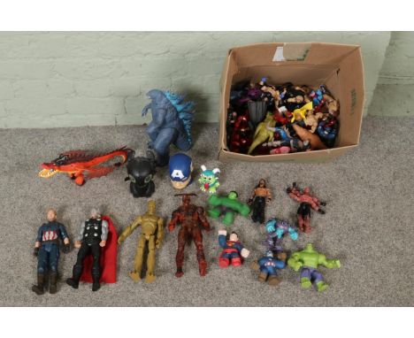 A box of assorted children's action figures to include Superman, Scarlet Witch, WWE, Groot, Mr. Incredible, etc.