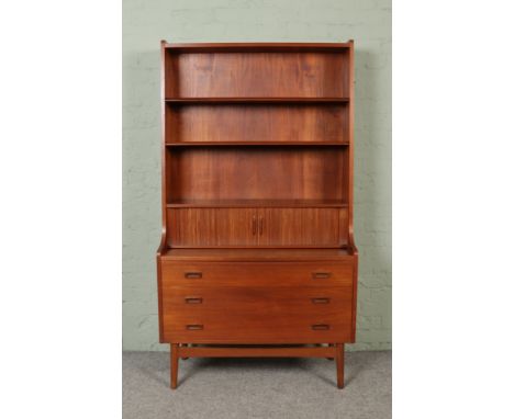 Johannes Sorth for Bornholm Mobler, a Danish teak secretaire bookcase, with two adjustable shelves above a tambour sliding se