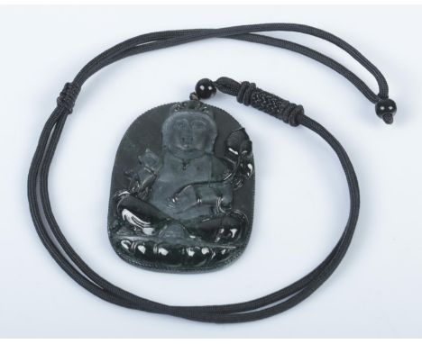 A black jade pendant featuring an adjustable necklace cord, crafted from Burma Type A jade. The pendant is hand-carved with a