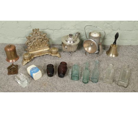 A mixed collection of miscellaneous items, including a brass letter rack and inkwells, a silver-plated teapot, a vintage Ever