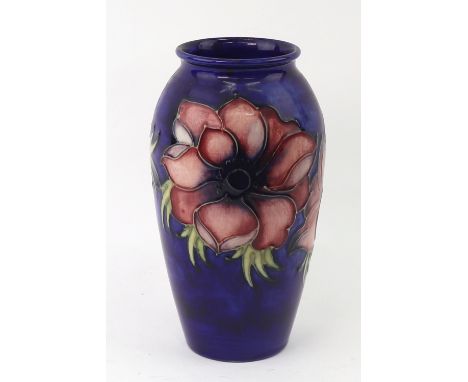 A William Moorcroft 'Anemone' pattern baluster vase, signed in green 'W M', to base and impressed 'Moorcroft, Made in England