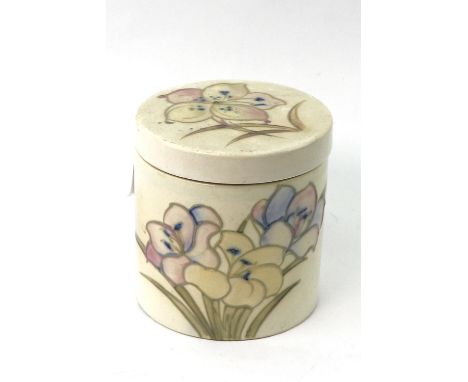 A William Moorcroft stoneware jar and cover, decorated with flowers, signed in blue 'W Moorcroft' to base and impressed 'Pott
