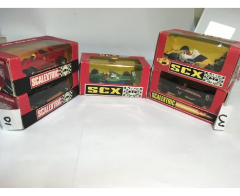 A selection of 5 boxed scalextric cars in good condition.