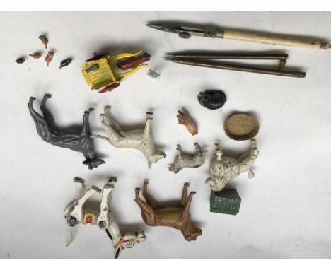 A small quantity of vintage lead animals a boxed Benbros milk cart and horse and other items