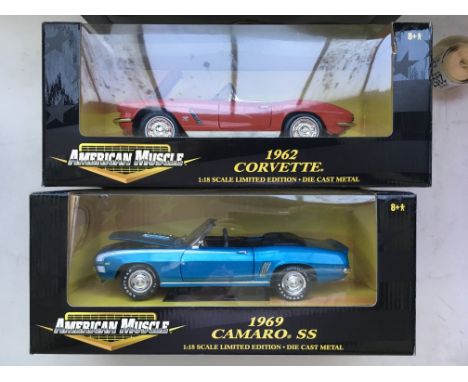 A collection of 4 mint boxed ERTL 1/18 scale American Muscle vintage sports cars