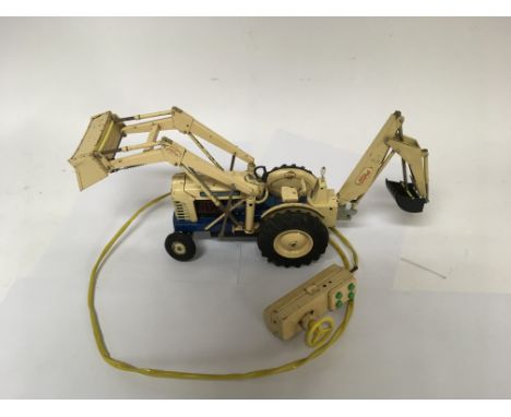 A Japanese battery operated Ford 4000HD industrial digger tractor