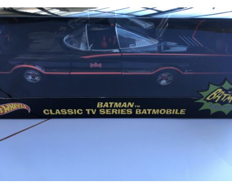 A boxed Batman Batmobile Diecast 1/18 scale vehicle by Hot Wheels.