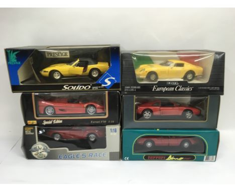 Six boxed die cast vehicles, various makes including Maisto and Solido.