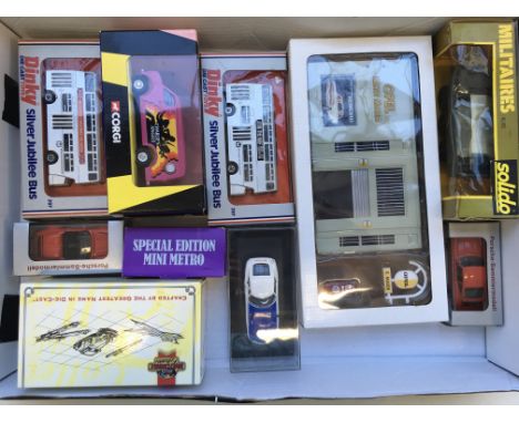 A box contains a collection of boxed model vehicles including Corgi, Dinky, Solido etc