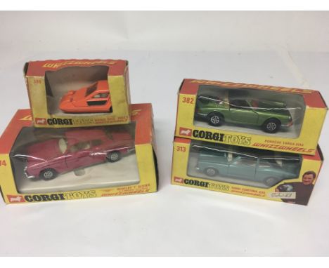 4 boxed Corgi Whizzwheels including No 313 Graham Hill ford cortina, No 382 Porsche Targa, No 274 Bentley and No 389 Bond Bug