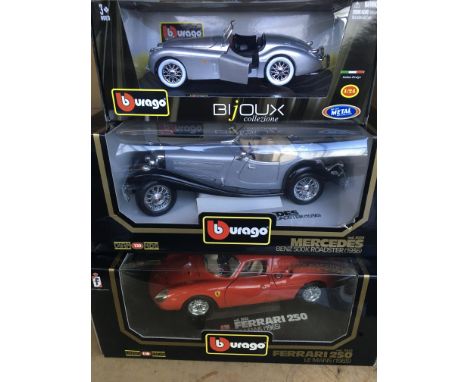 A collection of various scale mint boxed Burago models including 2 special collection models, 2 diamond collection, 2 ferrari