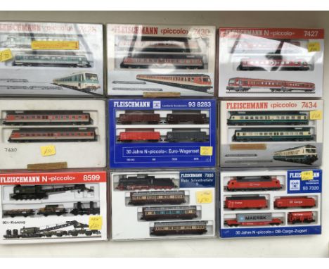 A collection of 9 boxed Fleischmann " N " gauge railway sets