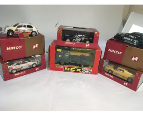 A selection of 5 ninco slot cars and 1 scalextric scx truck, all boxed and in good condition.