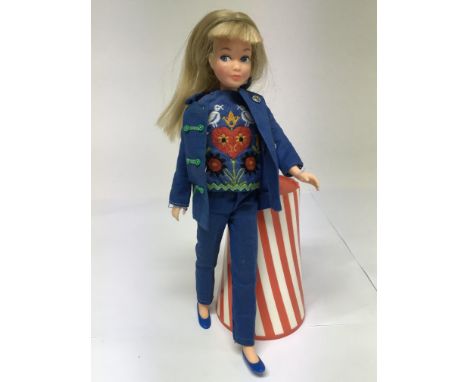 A vintage Skipper, Barbie’s younger sister, doll dressed in original labelled embroidered outfit.Stamped 1963 Mattel Inc.Sold
