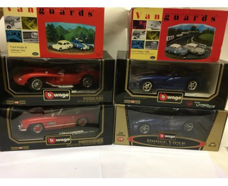 4 boxed Burago 1/18 scale model vehicles together with 2 boxed Vanguards classic racing sets .