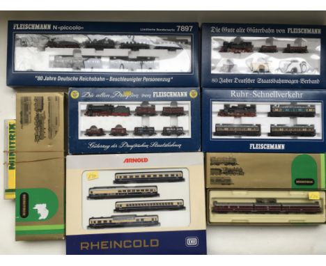 A collection of boxed " N " gauge Fleischmann , Arnold !and Minitrix railway sets.