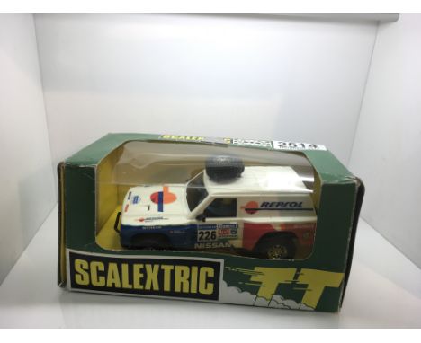 Scalextric patrol repsol and Peugeot 405 box and good condition.
