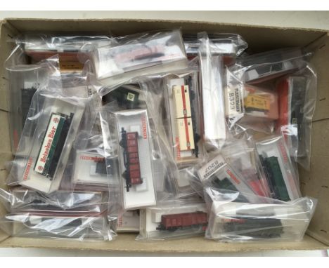 A collection of boxed " N " gauge railway goods wagons including Fleischmann.