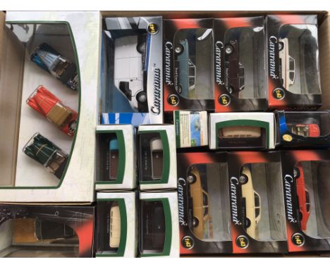 An extensive collection of mint boxed " Cararama " model vehicles from 1/43 to 1/72 scale in 2 boxes.