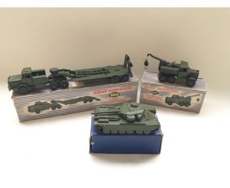 Three boxed Dinky Supertoys including Tank transporter No 660, Recovery tractor No 661 and Centurian tank No 651 ( no lid )