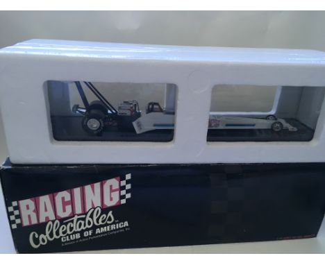 A mint in box American drag racing car by racing collectibles club of America together with a boxed Maisto Mercedes Benz and 