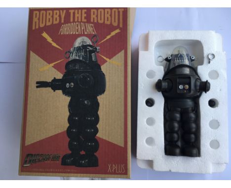 A boxed Robbie The Robot die cast articulated by X plus.