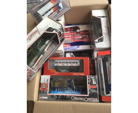 A large collection of mint boxed Corgi and Original Omnibus buses , coaches and balloon trams.