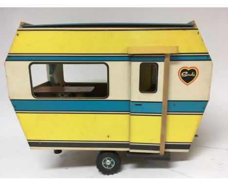 A vintage 1980’s Sindy wooden caravan