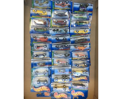 A collection of 31 Mattel Hot Wheel treasure hunts