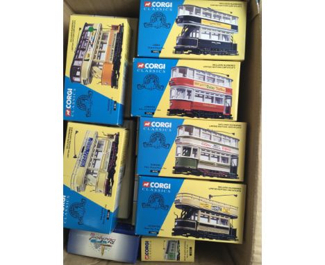 A large collection of mint boxed Corgi trams.