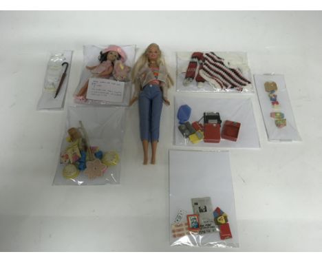 A  ‘twist n turn Sunset Malibu’,  straight legged Barbie doll with blonde hair and original clothes, stamped Mattel inc.1998.