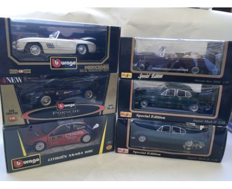 A collection of 9 boxed 1/18 scale model vehicles including Anson, Burago, Maisto and Gate